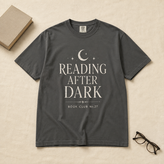 Woman wearing Reading After Dark Book Club T-Shirt in a bookstore